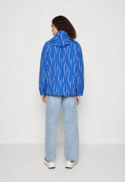 HUF New Day Packable Anorak Unisex - Waterproof Jacket - Blue -Modern Classic Shoes Store 75bcd1875d834105aa917794a86f219d