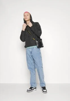 Puma Staple Anorak Jacket - Windbreaker - Black -Modern Classic Shoes Store de25259e7cfe4b52bc52a45ea59de640